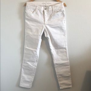 Mid rise white denim skinny jeans